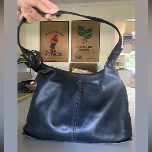 The Sak - vintage 90s black leather bag.